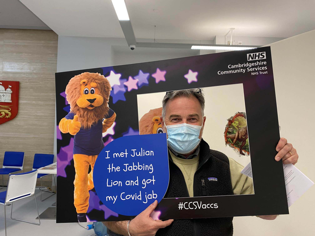 staff working alongside nhs on raising awareness around covid