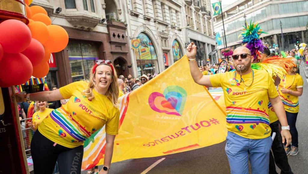 aviva pride case study working with production bureau team to design flags, leaflets, window decals